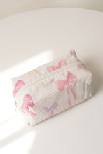 THE BOW CLUTCH